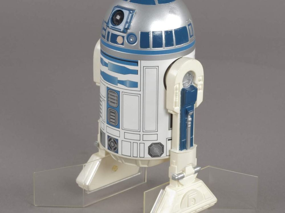 An R2-D2 action figure issued for The Empire Strikes Back. Credit: National Air and Space Museum.