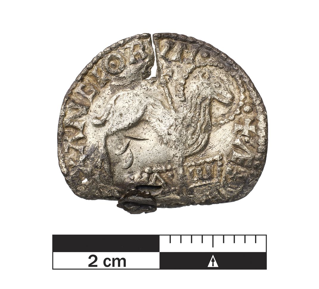 This coin shows a lamb pierced by a cross.