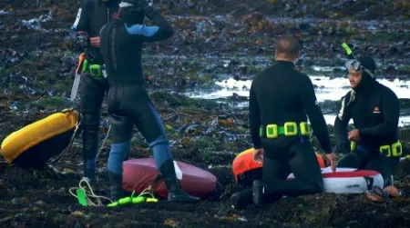 These Northern California abalone divers have bagged their limits and are out of the water again safely. On some "ab" dives, tragic accidents happen.