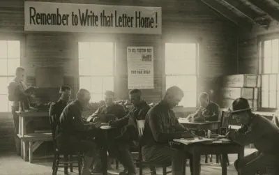 World War I soldiers writing letters home