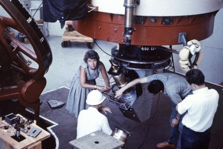 Vera Rubin works with a telescope at Lowell Observatory in Arizona in 1965. 