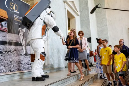 Spacesuit builders ILC Dover and Collins Aerospace showed off their privately developed Astro exploration suit at an event on Capitol Hill last July. NASA may need help from such commercial ventures if it hopes to make a 2024 moon landing.