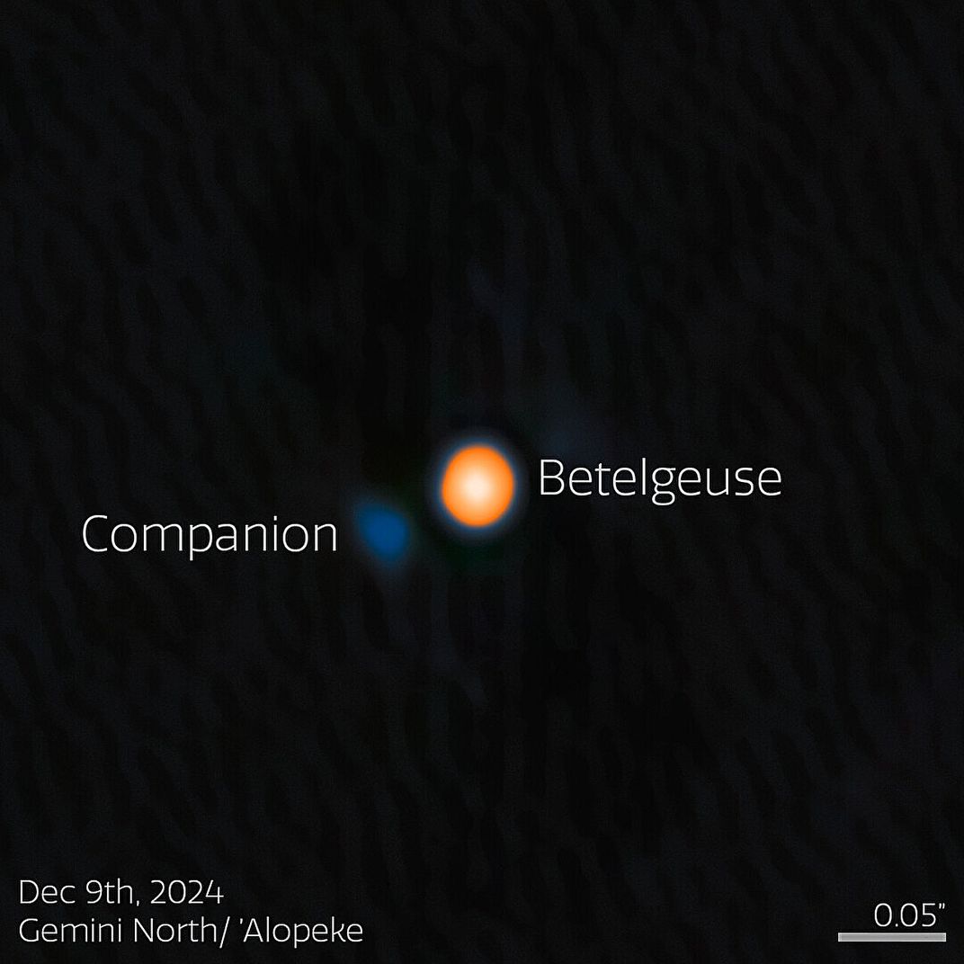 a photo showing betelgeuse, a bright star, and a faint blue companion