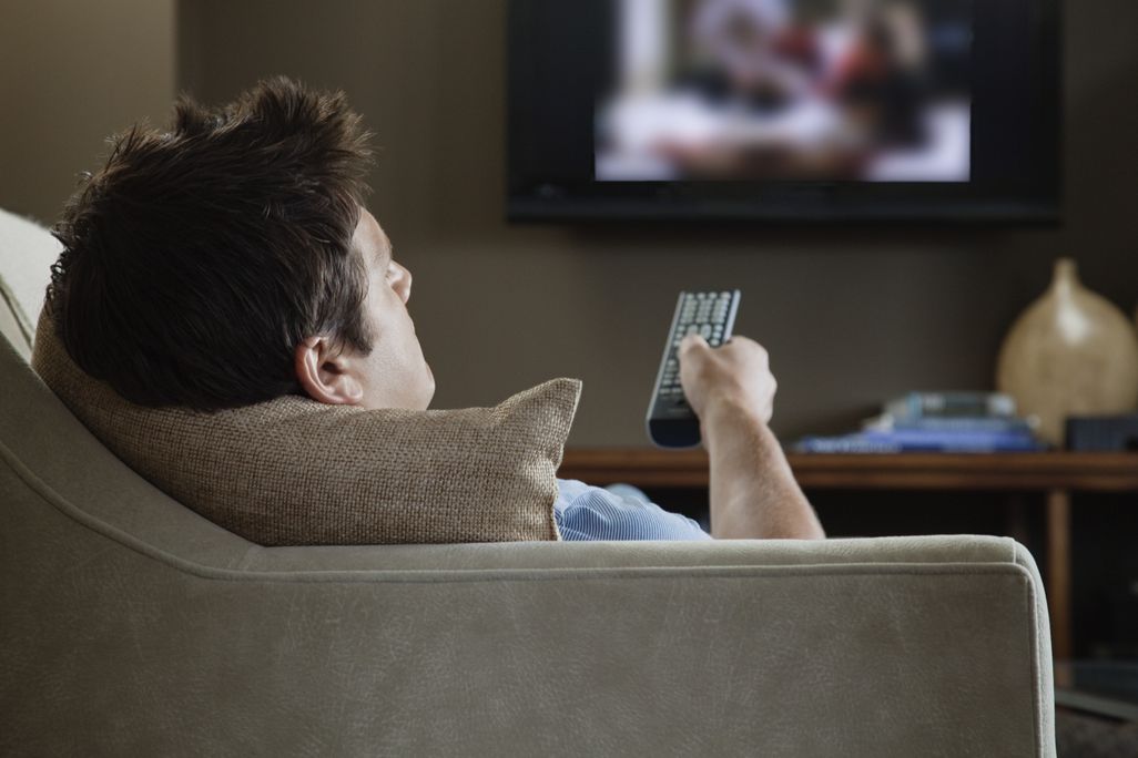 man watching television