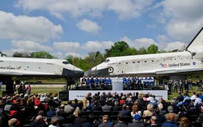 Discovery, right, greets the departing Enterprise, left, at the Welcome Discovery ceremony.