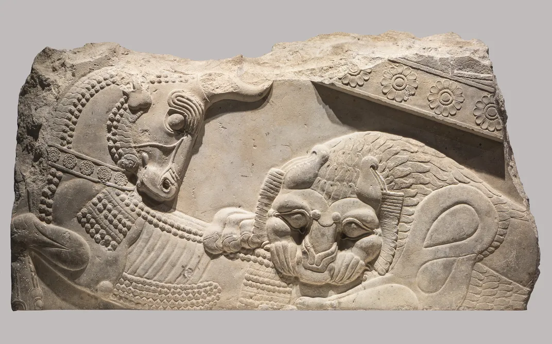 Achaemenid relief with a lion and bull in combat, dated to between 359 and 338 BCE.