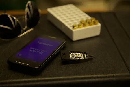 Slipped into the handle of an officer's firearm, this sensor keeps commanders aware of on-duty activity.