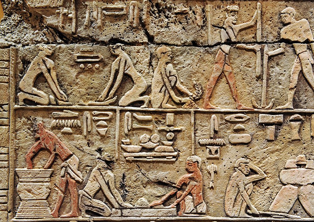  A stone carving depicting the ancient beer-making process, including the use of discovered ancient yeast strains.