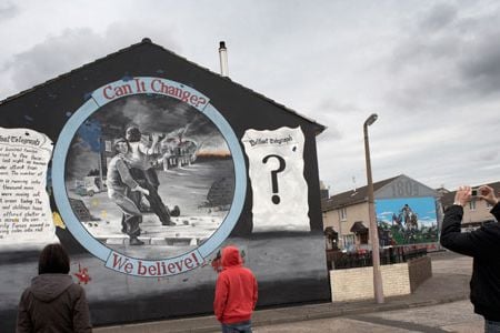 In a once strife-torn Belfast neighborhood (where murals today dramatize a message of hope), reconciliation is taking hold.  Even so, says Father Aidan Troy, formerly of a Belfast parish, progress must be nurtured day by day: "Peace is a delicate plant."