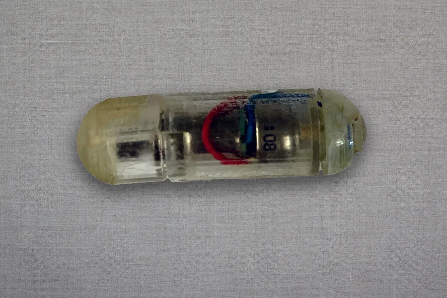 Small pill with electronics inside