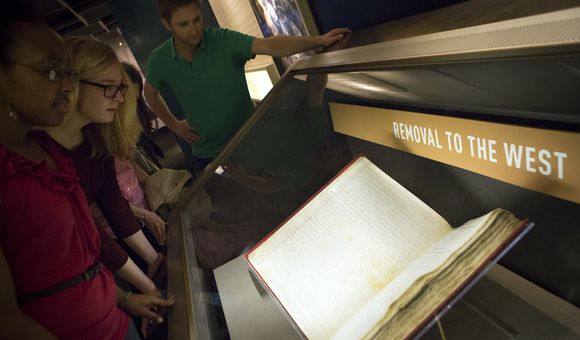 Visitors to the National Archives in Washington, D.C., viewing the Removal Act of 1830. Photo for the National Archives by Jessica Deibert