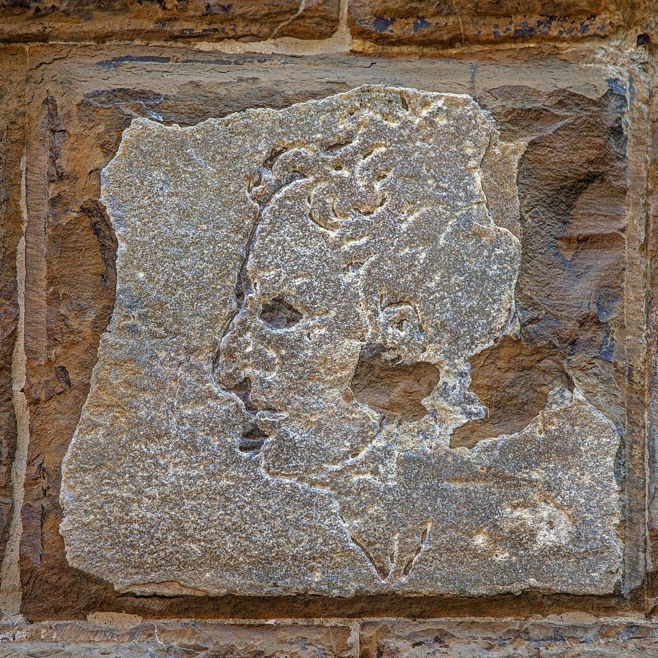 Did Michelangelo Carve a Graffiti Portrait Into This Florentine