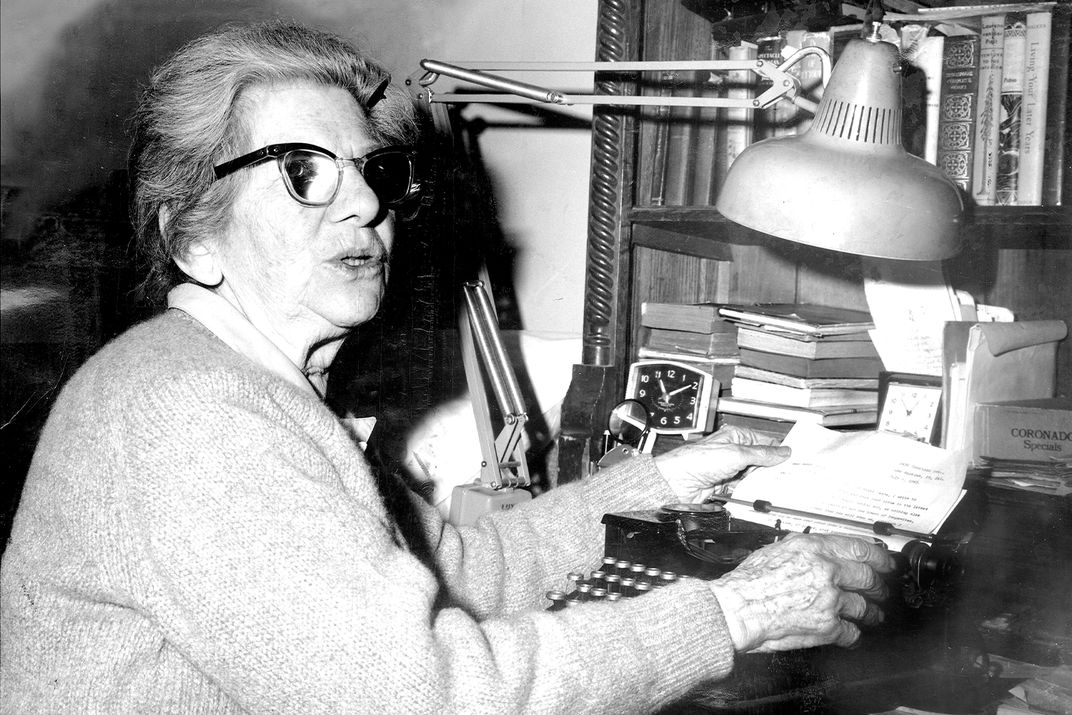 The author at her desk in December 1964