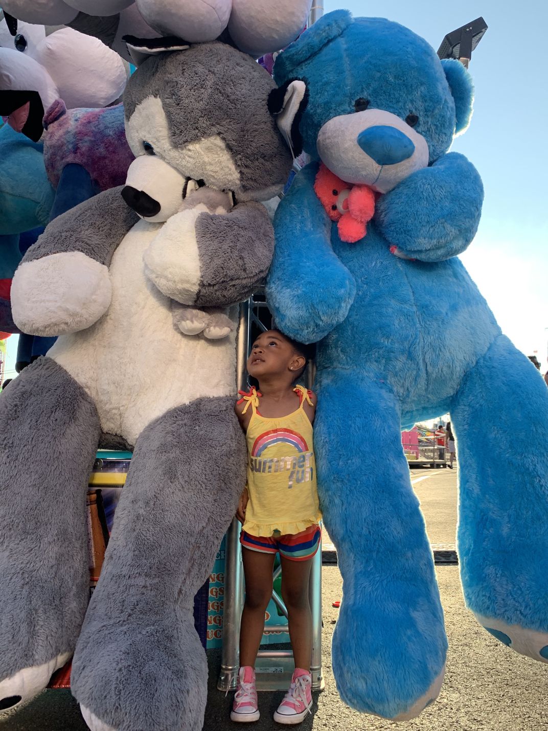 Young Girl with Stuffed Animals