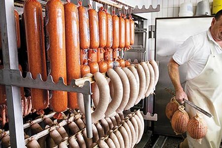 Otto Wolf readies meats for the smoker at the Glasbrenner Butchery, a shop near Stuttgart owned by one of a dwindling number of master butchers in Germany.
