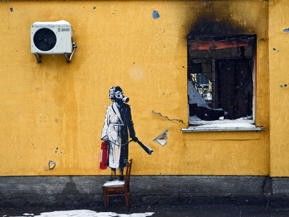 The mural by England-based street artist Banksy