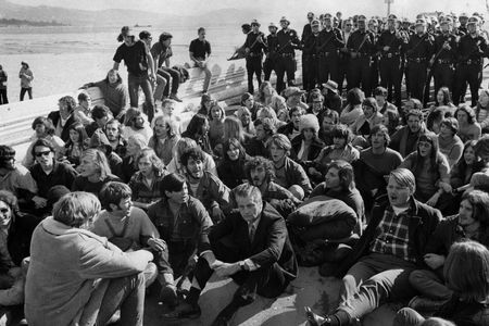 Police move in behind students blocking entrance to the Santa Barbara wharf on the first anniversary of the Santa Barbara oil spill on January 29, 1970 in Santa Barbara, California.