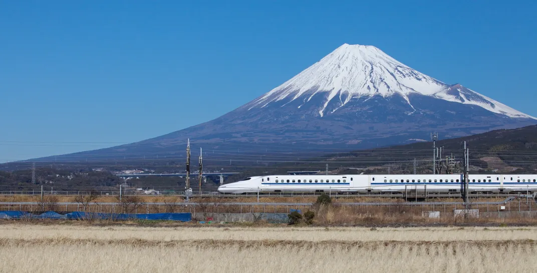 Japan's bullet train with Mt. Fuji in the distance
