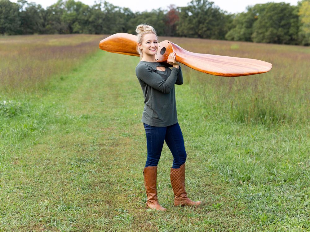 Alaina Lews displays propeller