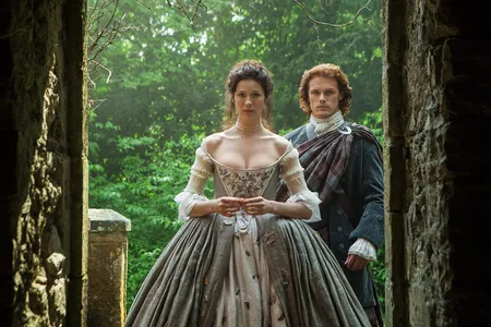 Caitr&iacute;ona Balfe as Claire Fraser (left) and Sam Heughan as Jamie Fraser (right) in season one of "Outlander"