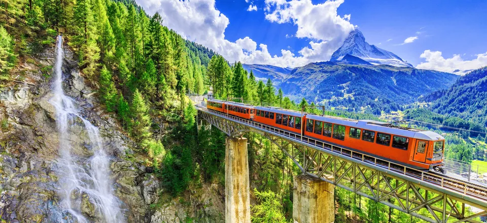  The famous <i>Gornergrat Bahn</i> against the backdrop of the Matterhorn in the Swiss Alps 