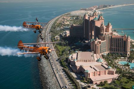 Breitling wingwalkers perform over the resort hotels on Dubai's Palm Islands.