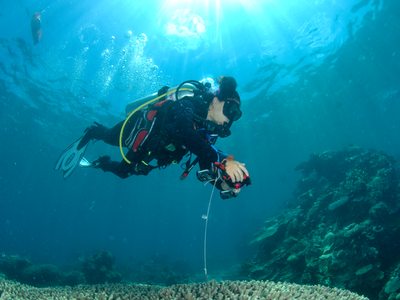 Environmental scientist Alexandra Ordoñez Alvarez from the University of Queensland collects data in Far Northern Great Barrier Reef on Ashmore Bank.