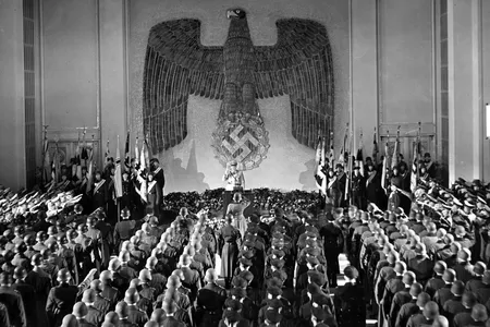 Hermann Göring’s speech in the Air Ministry building was delayed for 63 minutes by an air raid. When he resumed, the UPI reported, his speech “was uninterrupted by applause.”