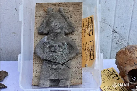 This blue-pigmented figurine was found buried with the oldest child.