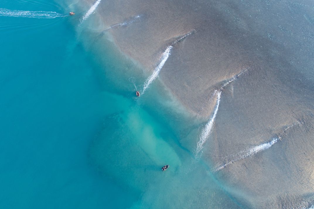 The ebbing tide pours off Montgomery Reef in the Kimberley, Australia.