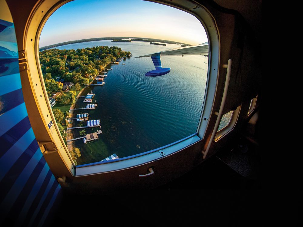 image of lake through aircraft window