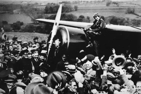 Earhart first crossed the Atlantic in 1928, as a passenger. Four years later, she flew solo from Newfoundland to Ireland in a Lockheed Vega. Here, the beaming villagers of Culmore, North Ireland, pay homage to the rising star.
