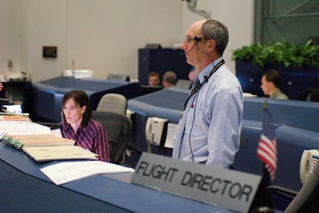 Flight Director Paul Dye presides in Mission Control during the STS-115 shuttle mission in 2006.