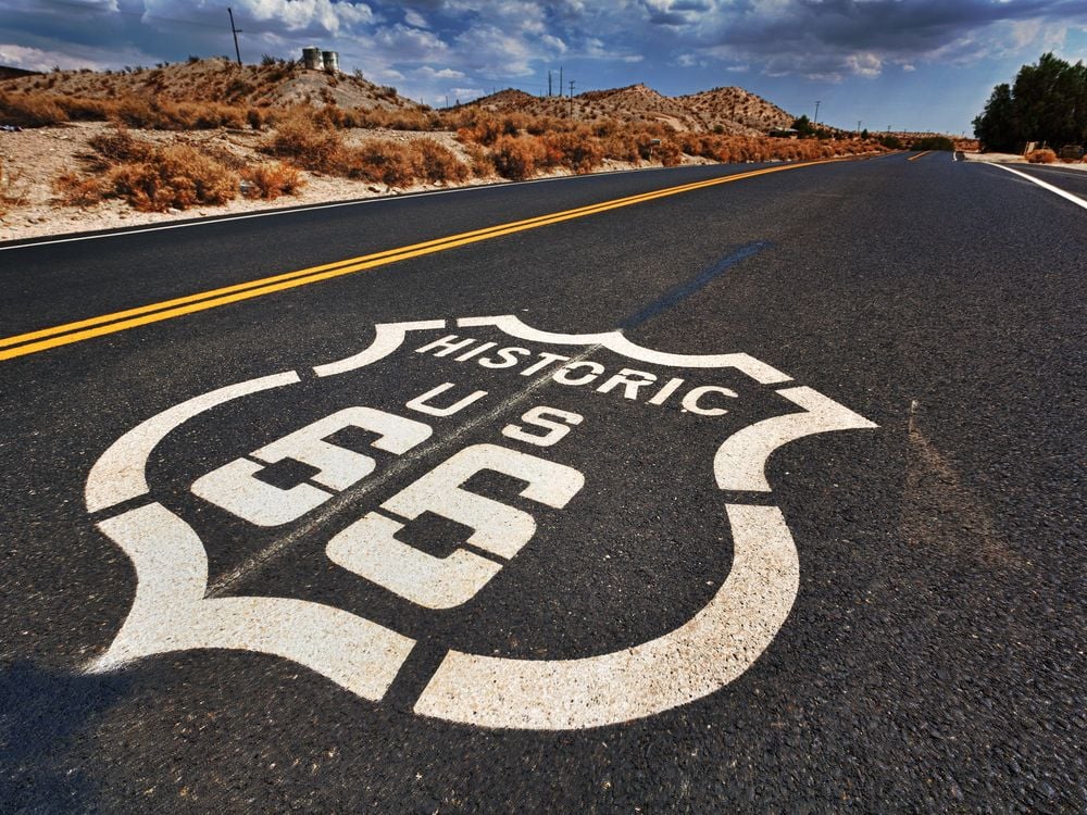 Historic U.S. Route 66 written in white paint on highway