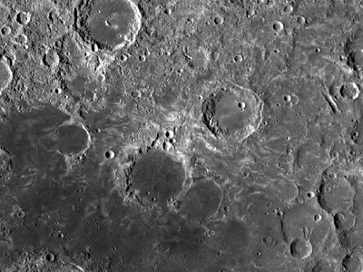 Swirls near Mare Marginis on the eastern limb (20˚N, 90˚E) of the Moon.  This region hosts magnetic anomalies, grooved terrain, and is antipodal to the youngest basin on the Moon, Orientale.  The origin of lunar swirls is still unknown.