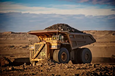 A giant truck carrying tar sand from a mine in Canada