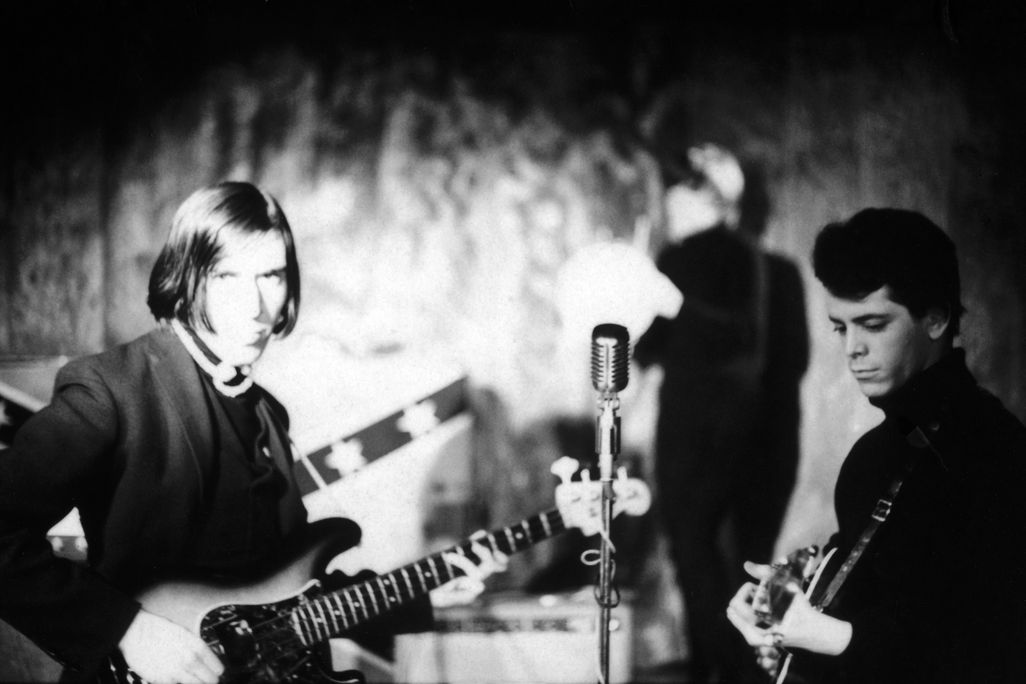John Cale and Lou Reed of the Velvet Underground perform on stage at the Cafe Bizarre, New York, December 1965.