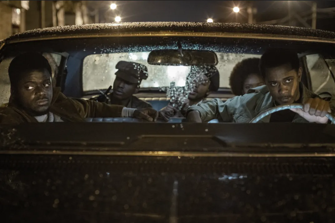 Daniel Kaluuya as Fred Hampton (far left) and LaKeith Stanfield as William O'Neal (far right)