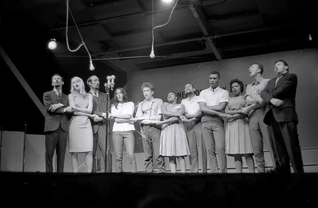 Bob Dylan; Peter, Paul and Mary; Joan Baez; Pete Seeger; Theodore Bikel; and the Freedom Singers at the Newport Folk Festival on July 28, 1963