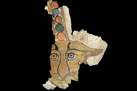 A digital reconstruction of a 2,000-year-old sarcophagus fragment adorned with the face of a leopard