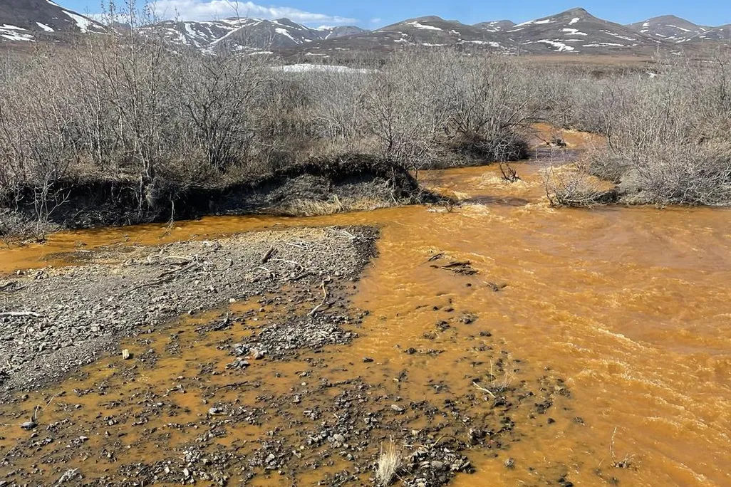 An orange tributary of the Kugororuk River.