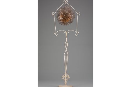 "Bird," 1990, David Hammons, painted metal, wire, basketball and feathers.