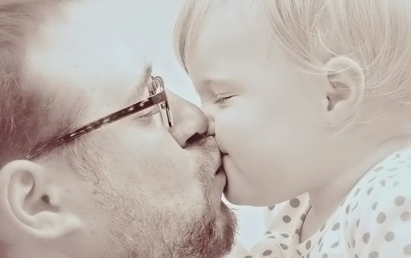 Daddy is every little girl's first love. No kiss is more precious than this. thumbnail