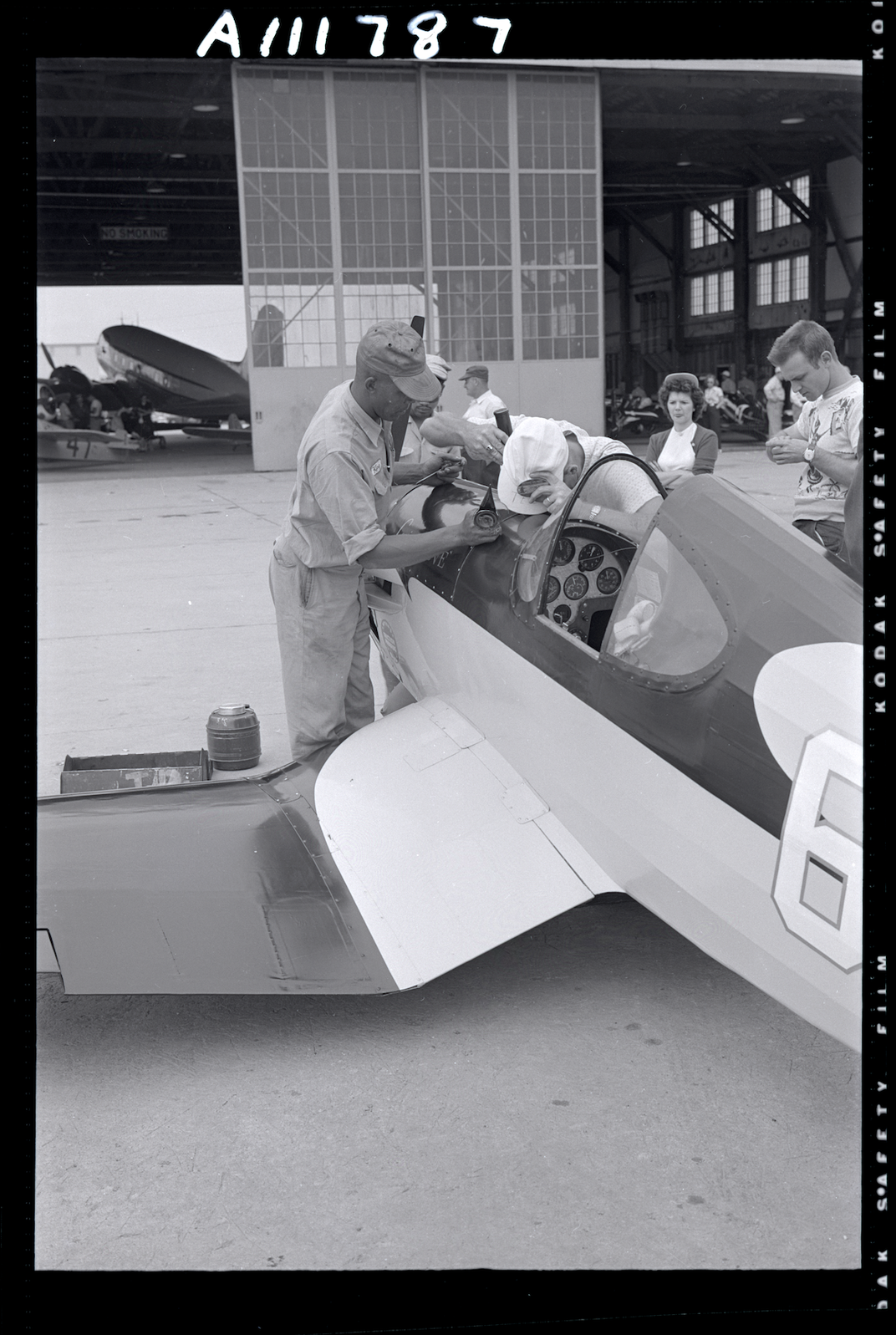 Loving works on his home-built racing airplane, Loving's Love​​​​​​​