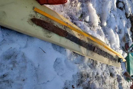 The double-edged sword was deliberately broken into three pieces.