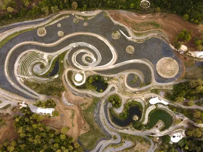 This Park Recreates Vincent van Gogh's 'The Starry Night' With a Dazzling Display of Plants, Trees and Winding Pathways image