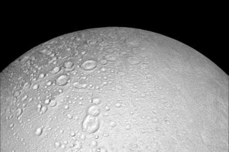 Cameras captured snowy craters scattered across the moon's north side.