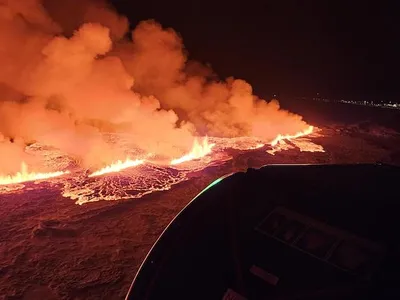 A volcano erupts near the evacuated town of Grindav&iacute;k in southwestern Iceland.
