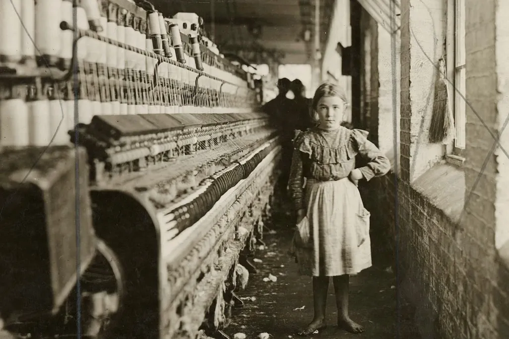 Lewis Wickes Hine's 1909 photograph of "a little spinner in a Georgia cotton mill"