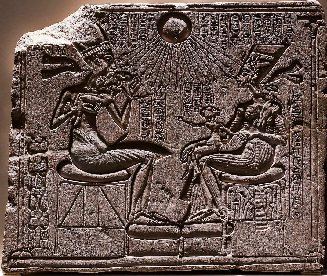 Ancient Egyptian relief depicting Akhenaten, Nefertiti and their children
